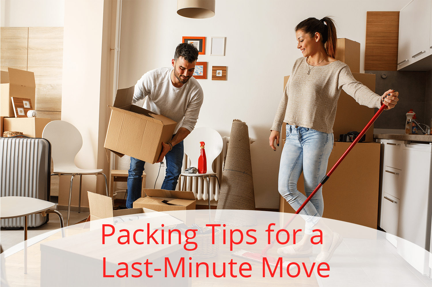 Man and woman packing up their home for a last minute move.